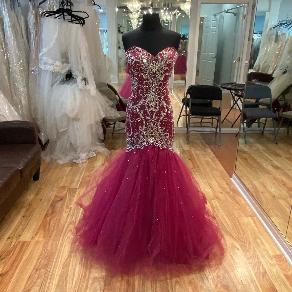 Mermaid beaded prom gown by Mori Lee in sangria